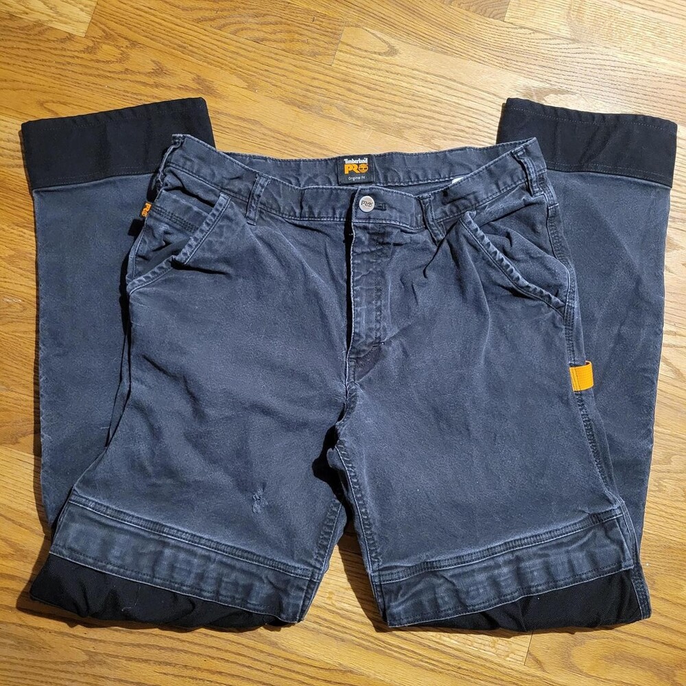 Black timberland carpenter pants with black knee patches and orange stitching #w